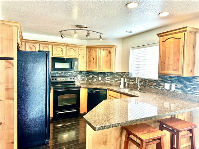 Sandy Condo: 90 E Resaca Dr