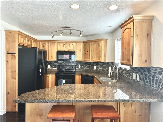 Sandy Condo: 90 E Resaca Dr