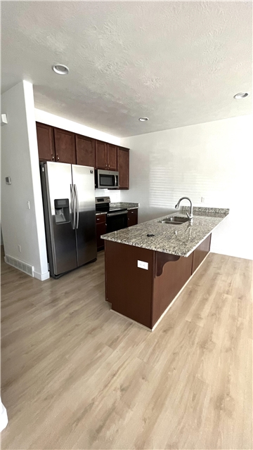 Riverton Townhome: 1248 W Saddlebred Way